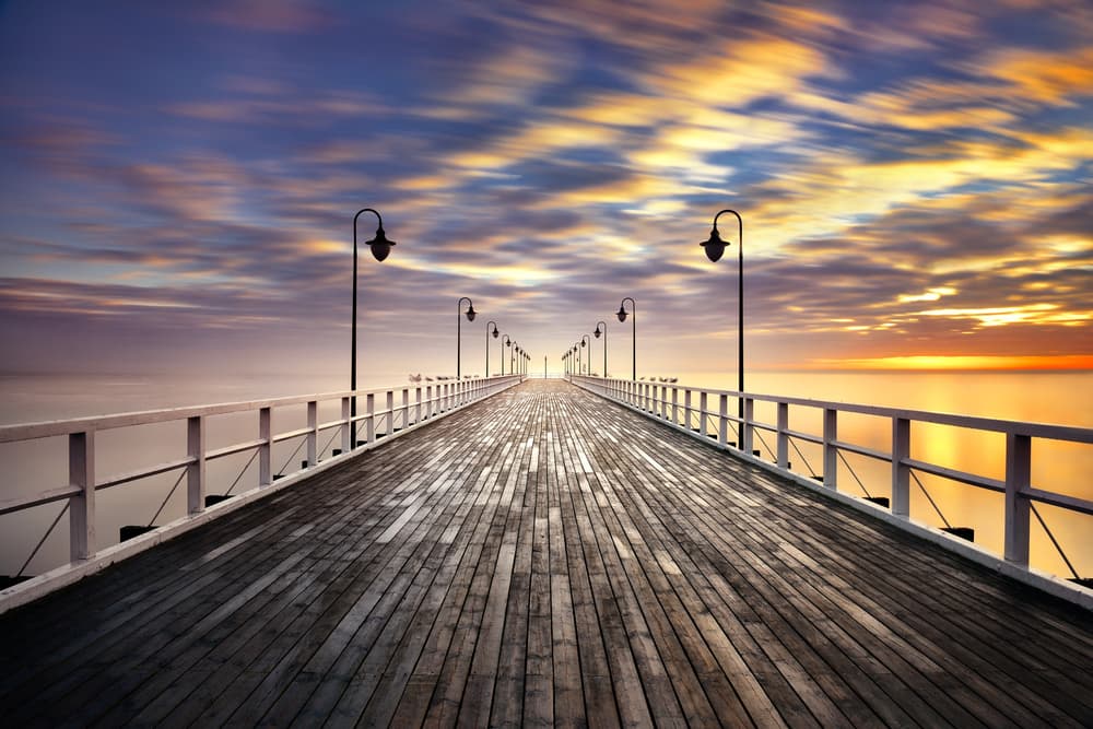 Vibrant Pier Sunset by Grzegorz Lewandowski — canvas wall art