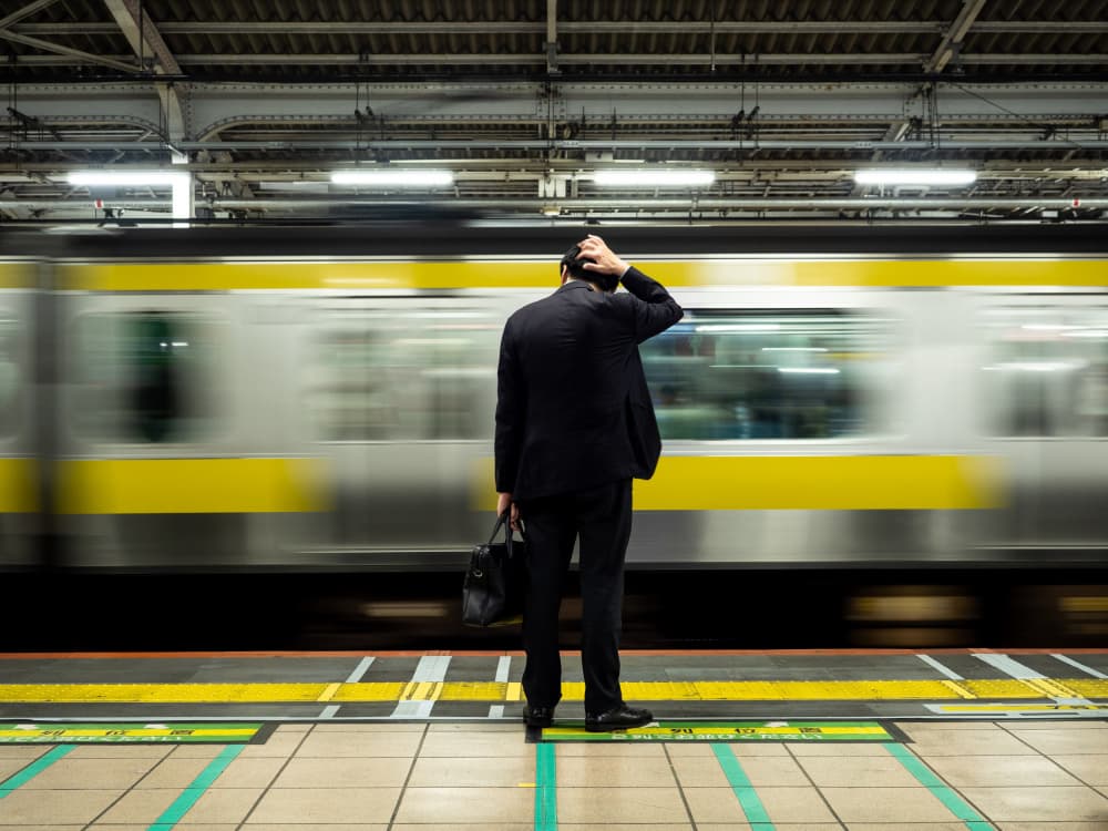 Man And Blurry Train by Lorenzo Luca Andriani — canvas wall art