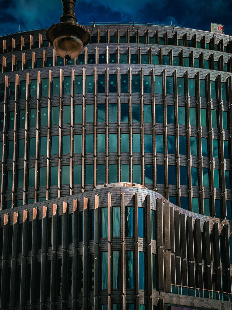 Modern Building Reflections by Dmitrii Rabeev — canvas wall art