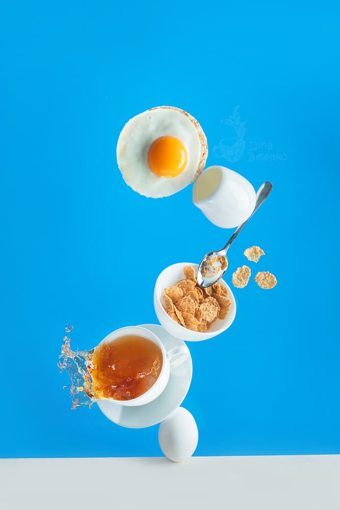 Floating Breakfast Balance by Dina Belenko — canvas wall art