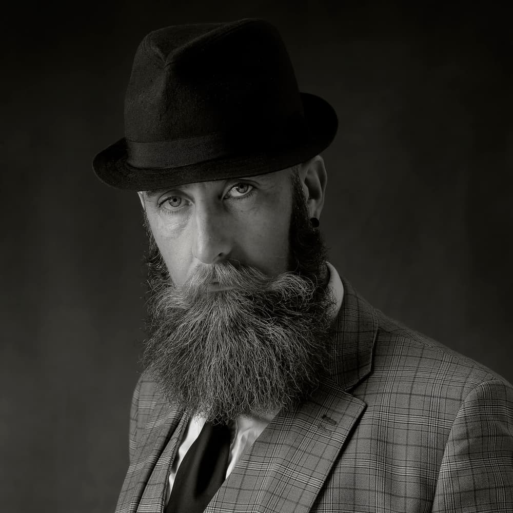 Sophisticated Bearded Man by Hugh Wilkinson — canvas wall art