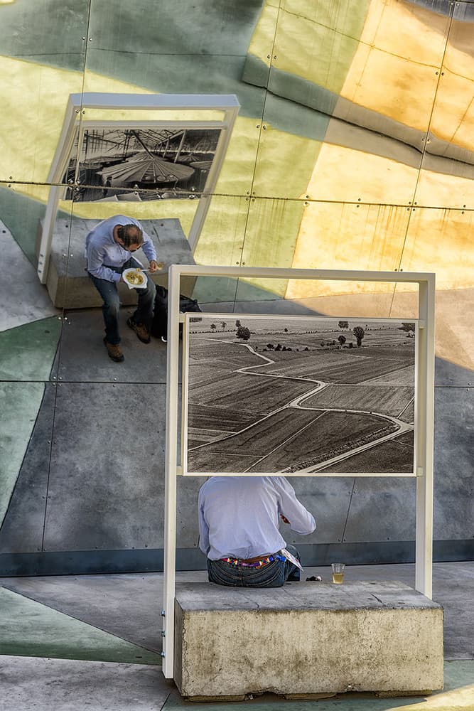 Men at Urban Exhibition by Roberto Marini — canvas wall art