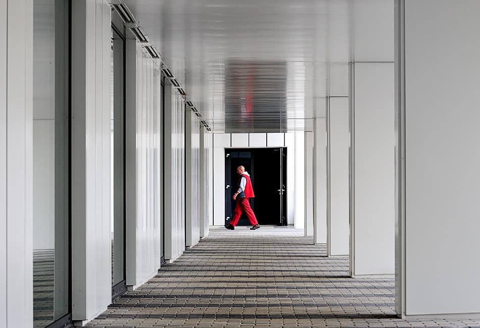 Man In Modern Corridor by Izidor Gasperlin — canvas wall art