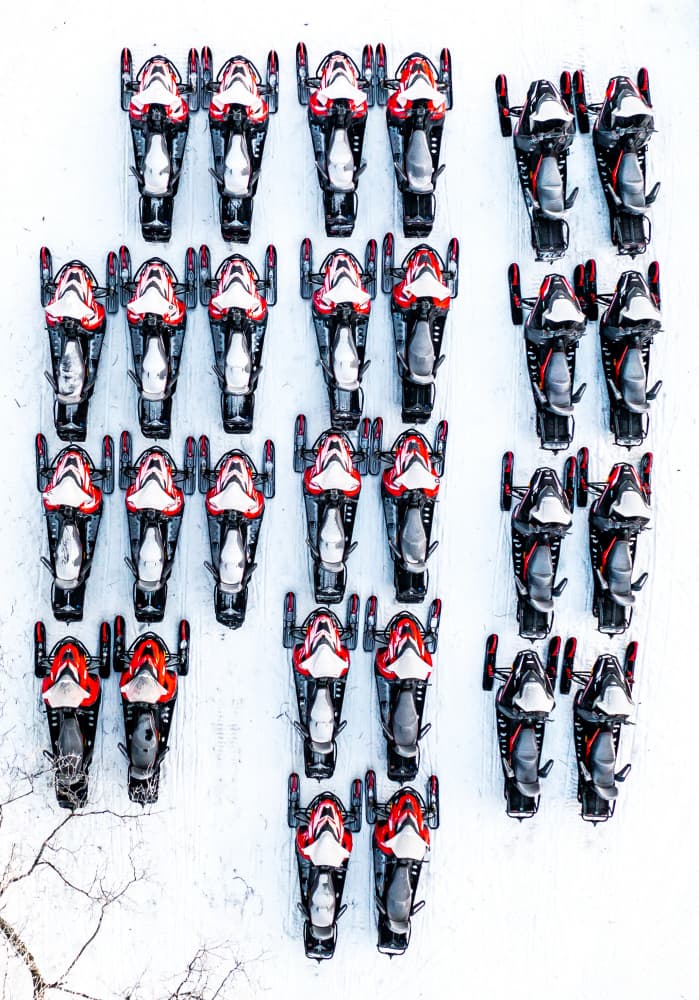 Winter Snowmobile Formation by Gilad Topaz — canvas wall art