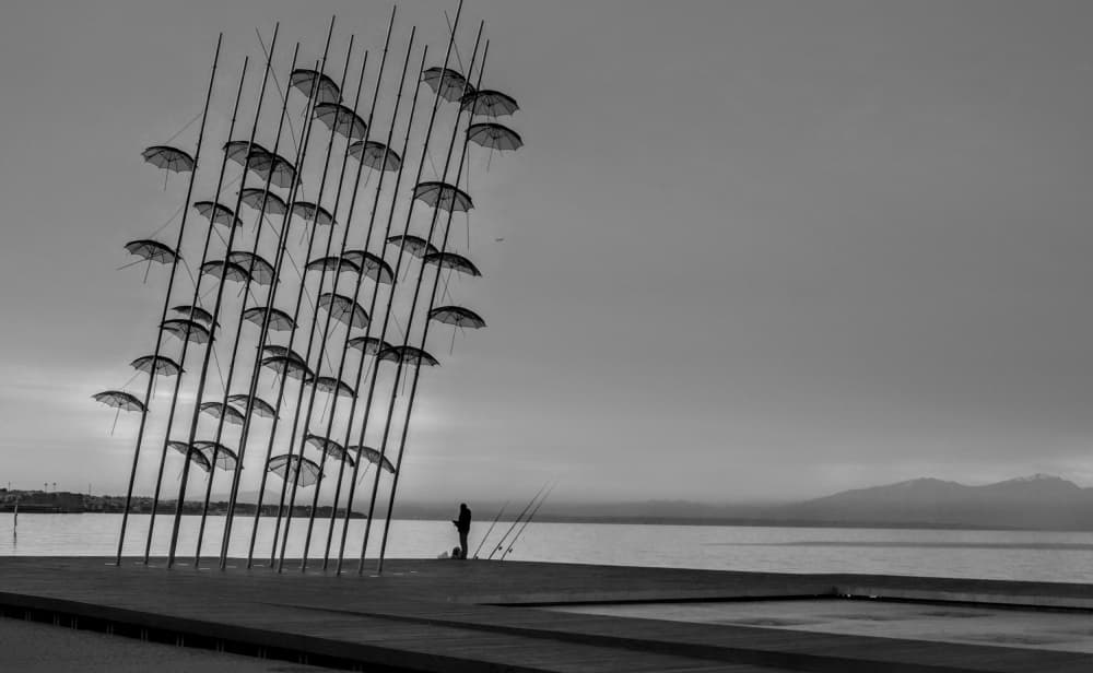 Fishing Under Umbrellas by Markos Tsoukalas — canvas wall art