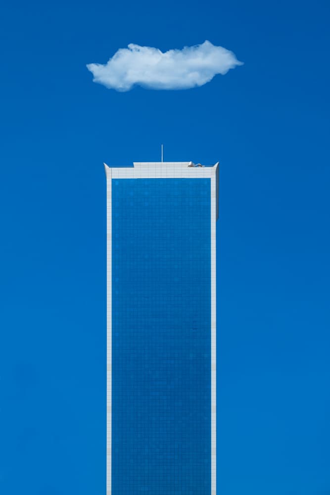 Cloud Over Skyscraper by Rolf Endermann — canvas wall art