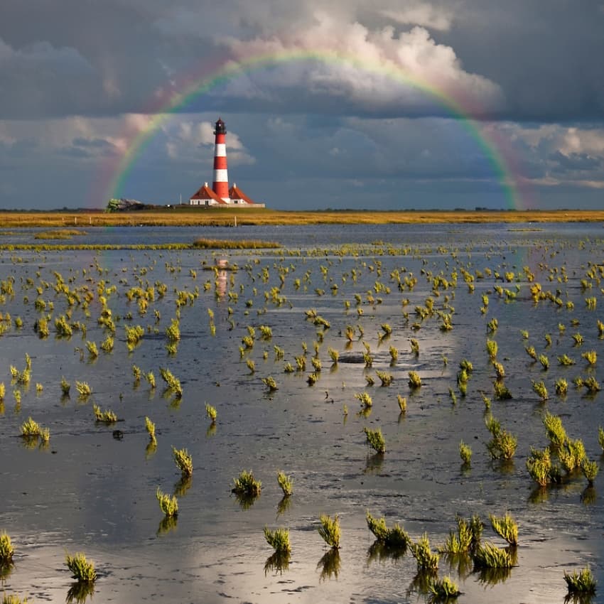 Striped Lighthouse Rainbow View by Carsten Meyerdierks — canvas wall art