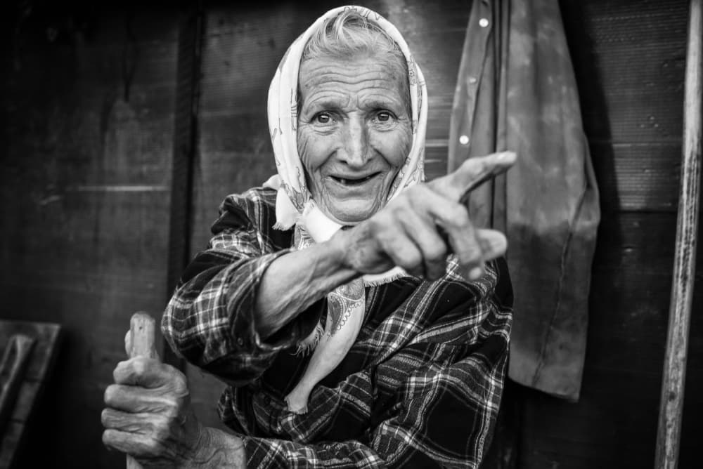 Happy Grandma Pointing by Grigore Roibu — canvas wall art