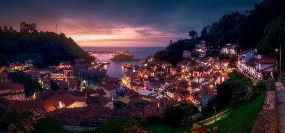 Glowing Hillside Village by Pablo Mauriz — canvas wall art