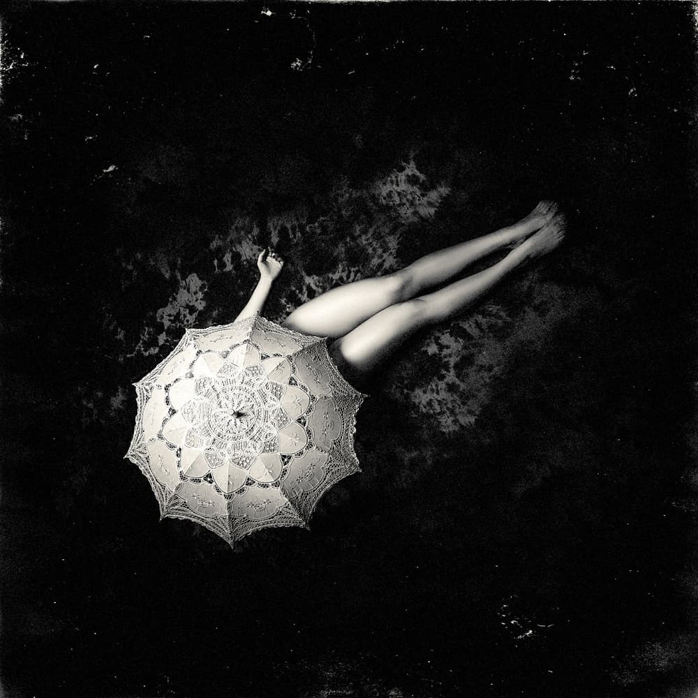 Floating Lace Umbrella by Ruslan Bolgov — canvas wall art