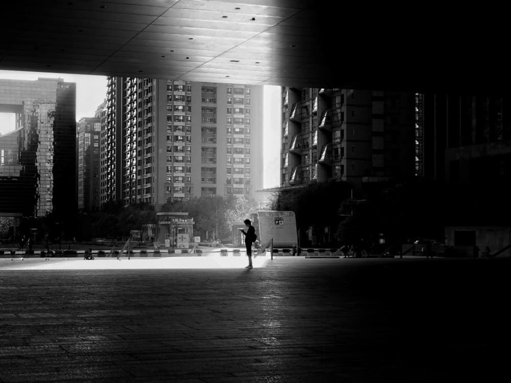 Solitary Figure City Light by Yi-Tang Wang — canvas wall art