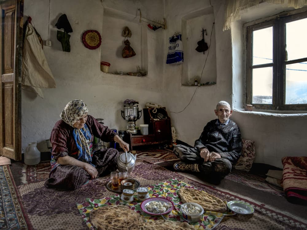 Old Couple Tea Time by Abbas Arabzadeh — canvas wall art