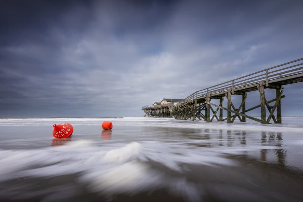 Ocean Pier Red Buoys by fotomarion — canvas wall art