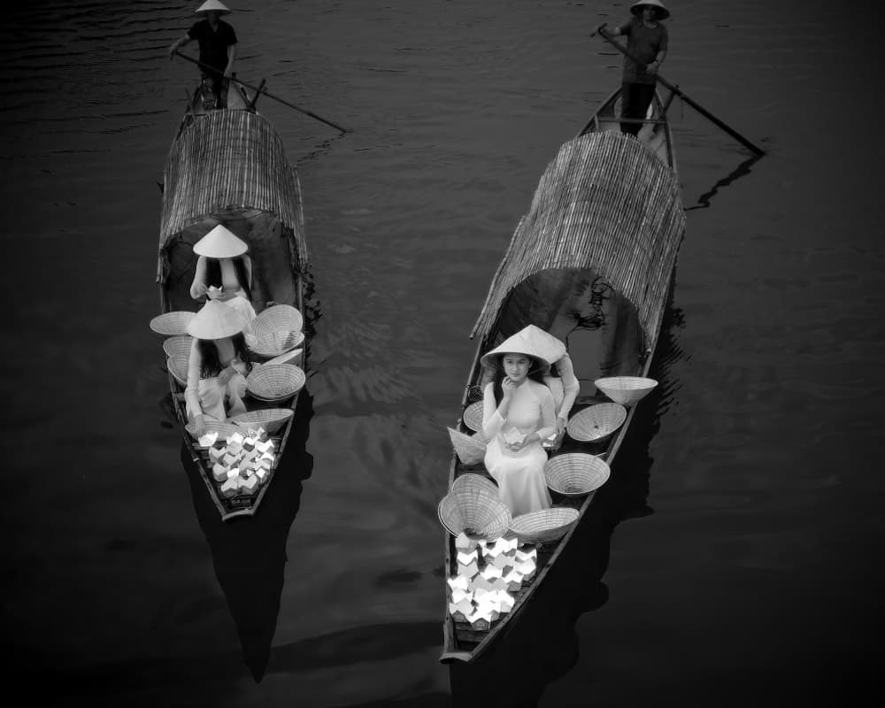 Vietnamese Women on Boats by Dev Sirikulthada — canvas wall art