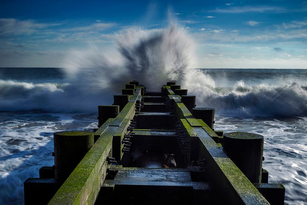 Crashing Wave on Pier by verdon — canvas wall art