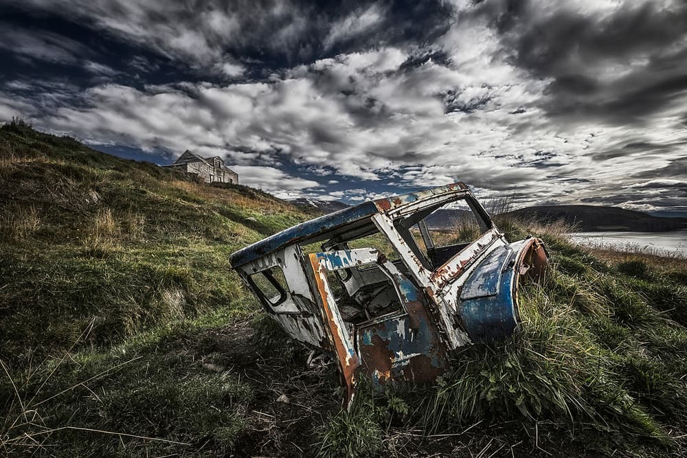 Old Rusty Car Landscape by Bragi Ingibergsson - BRIN — canvas wall art
