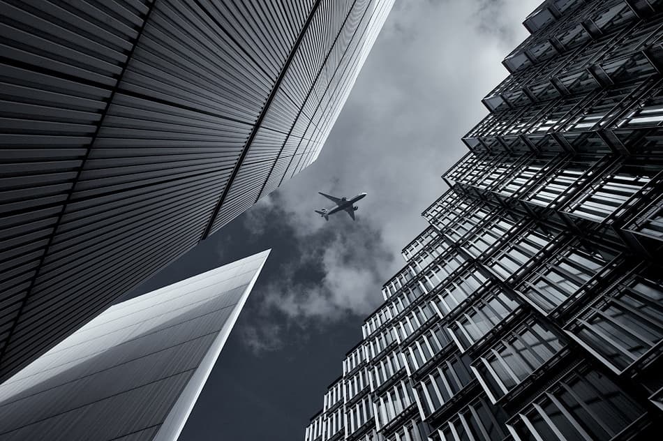 Modern City Flight by Michael Oates — canvas wall art