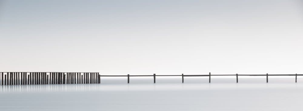 Serene Water Pilings by Lorenza Cancian — canvas wall art