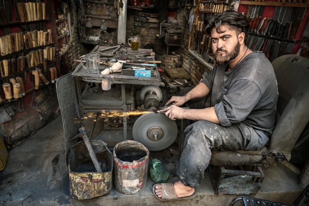 Focused Craftsman by Trevor Cole — canvas wall art
