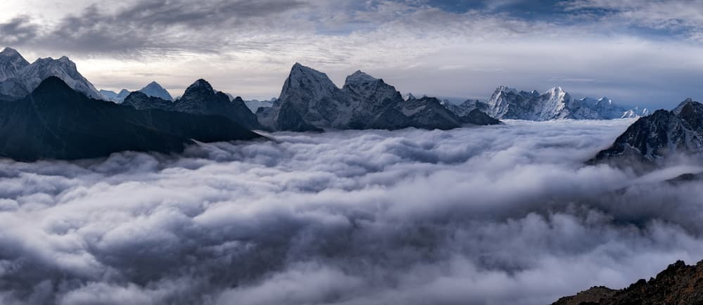 Peaks Above The Clouds by Alexey Kharitonov — canvas wall art