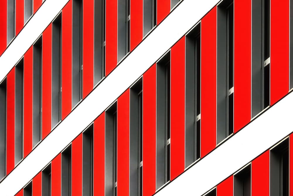 Geometric Red Facade by Hans-Wolfgang Hawerkamp — canvas wall art