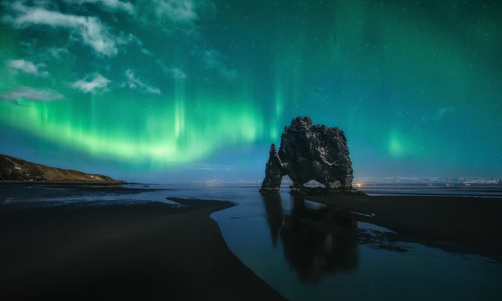 Vibrant Northern Lights Coast by Javier de la Torre — canvas wall art