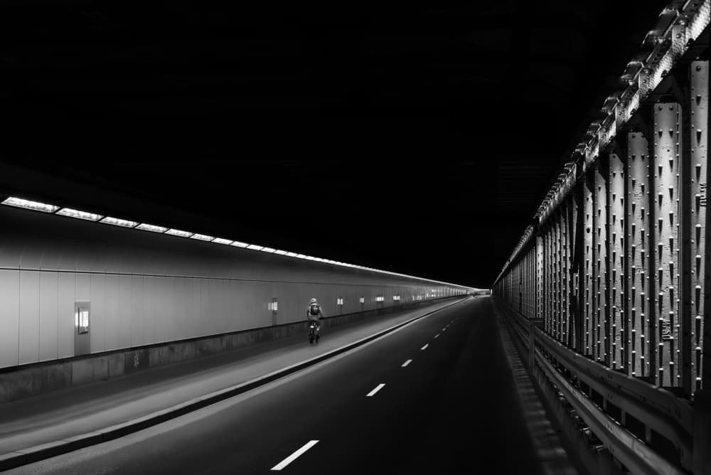 Lone Cyclist's Journey by Andy Dauer — canvas wall art
