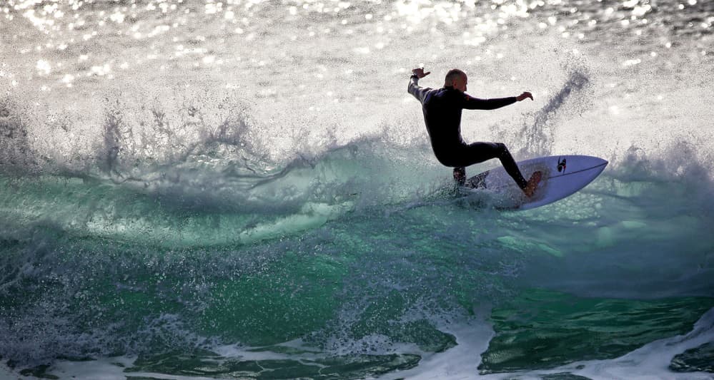 Green Wave Surfer by Eyal Bussiba — canvas wall art