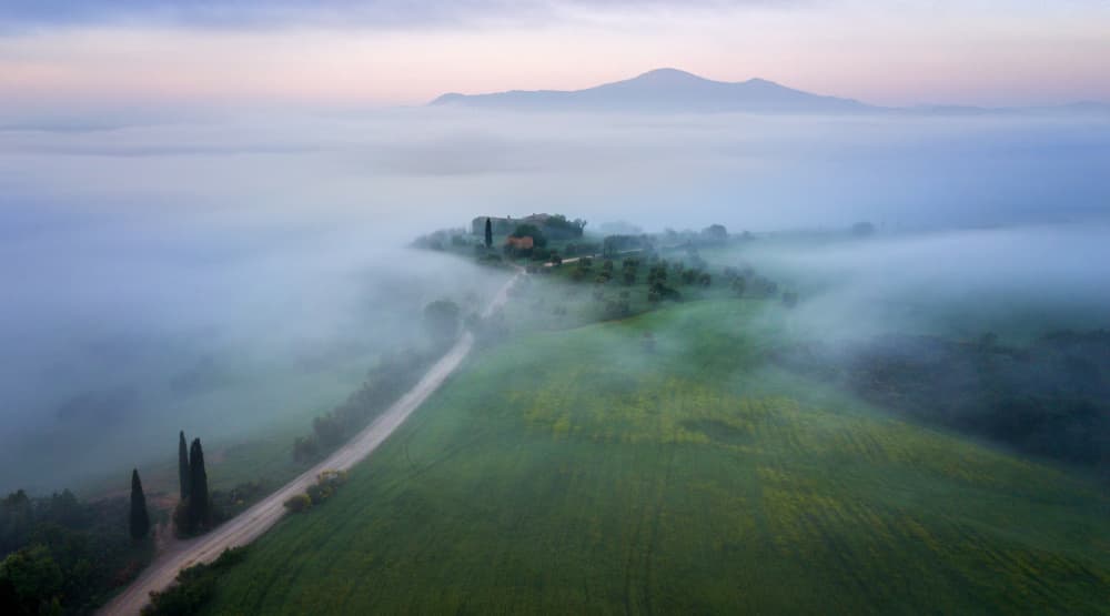 Morning Fog Over Hills by Paulo Nogueira — canvas wall art