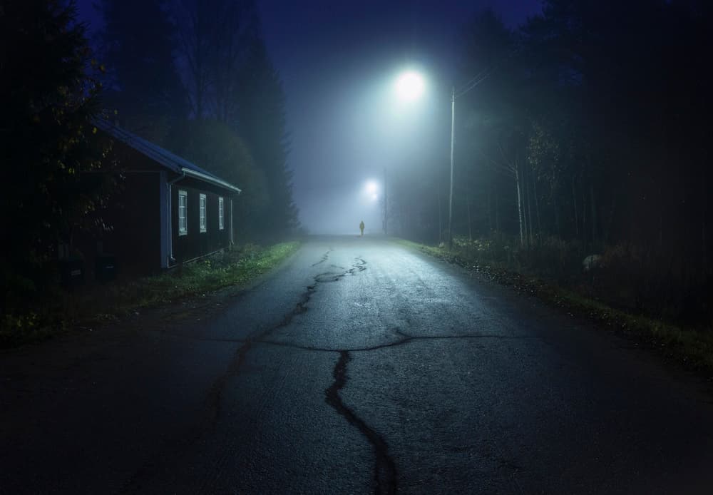 Lone Figure Foggy Night by Mika Suutari — canvas wall art
