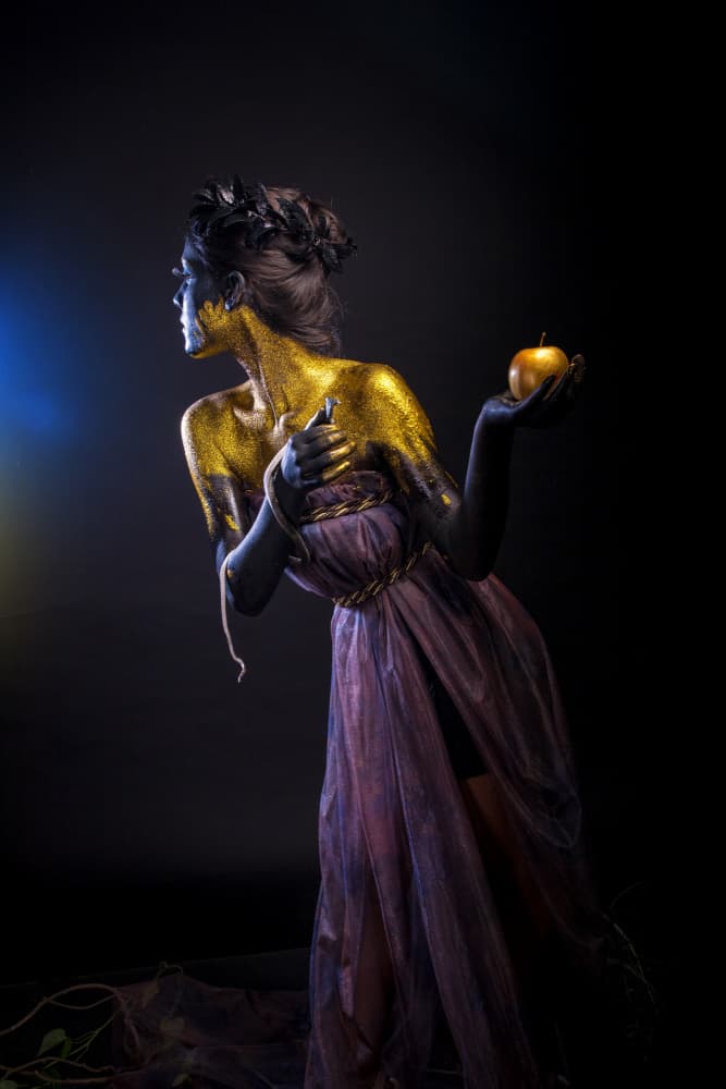 Golden Goddess with Apple by Dipankar Paul — canvas wall art
