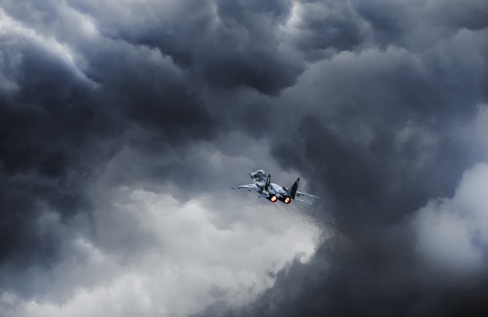 Fighter Jet Through Storm Clouds by Leon — canvas wall art