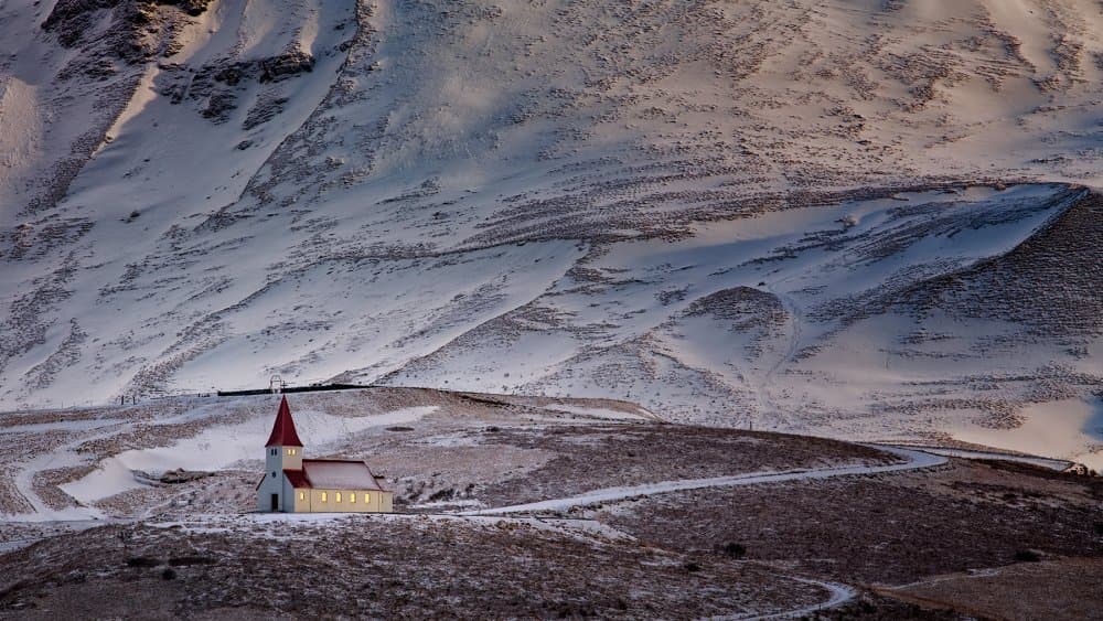 Glowing Winter Church by Luigi Ruoppolo — canvas wall art