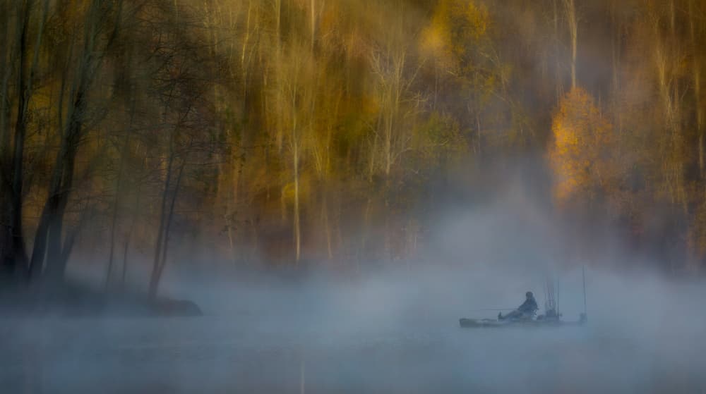 Autumn Kayaker In Mist by Yanny Liu — canvas wall art