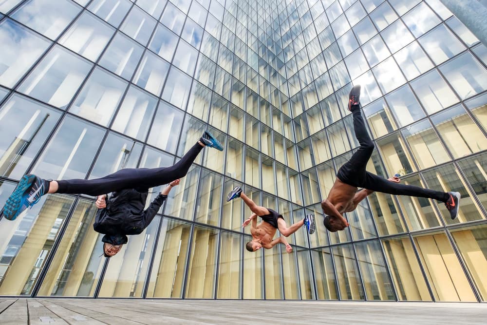 Urban Parkour Stunts by Tristan Shu — canvas wall art