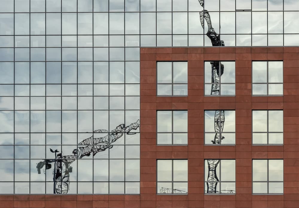 Building Crane Reflection by Jef Van den Houte — canvas wall art