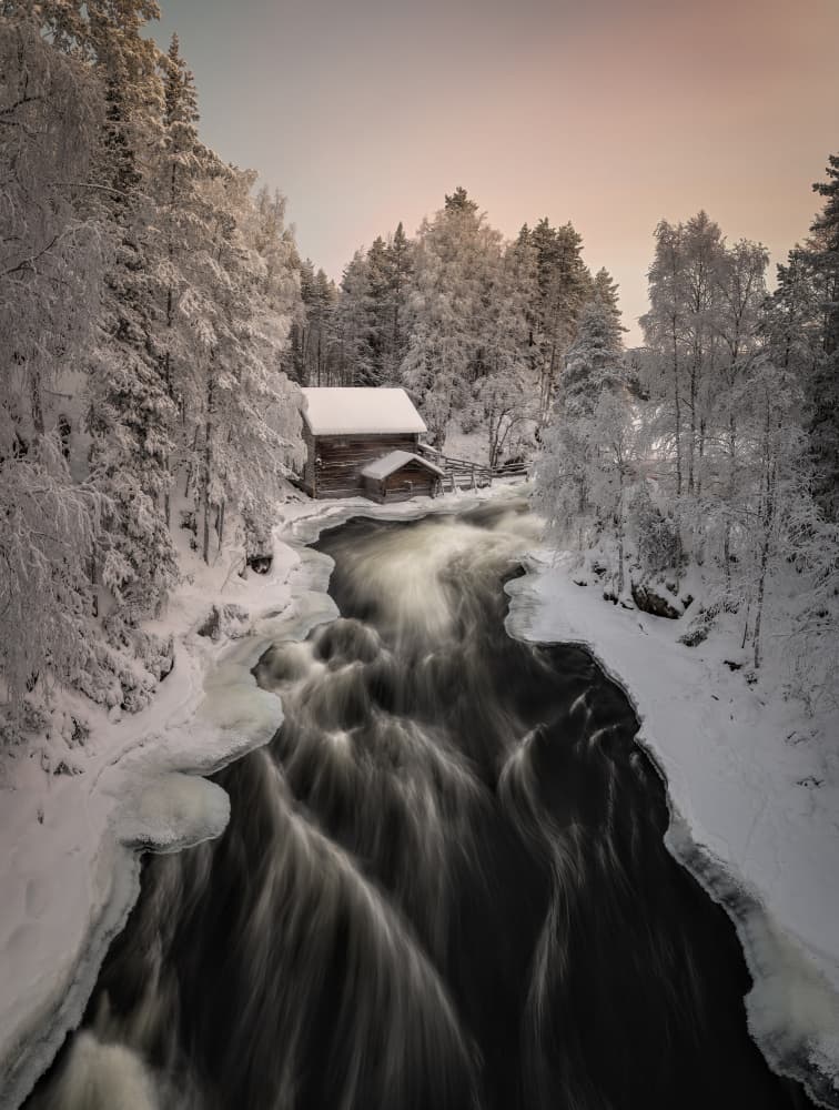 Winter River Cabin by Raimondo Restelli — canvas wall art