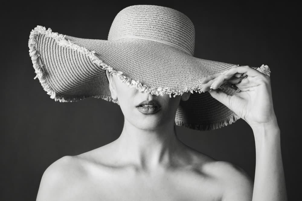 Elegant Woman Straw Hat by Maryamshaygan — canvas wall art