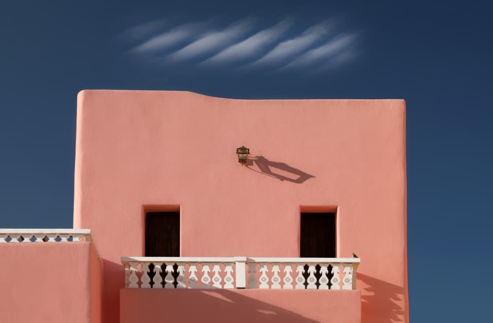 Pink House Blue Sky by Hans-Wolfgang Hawerkamp — canvas wall art
