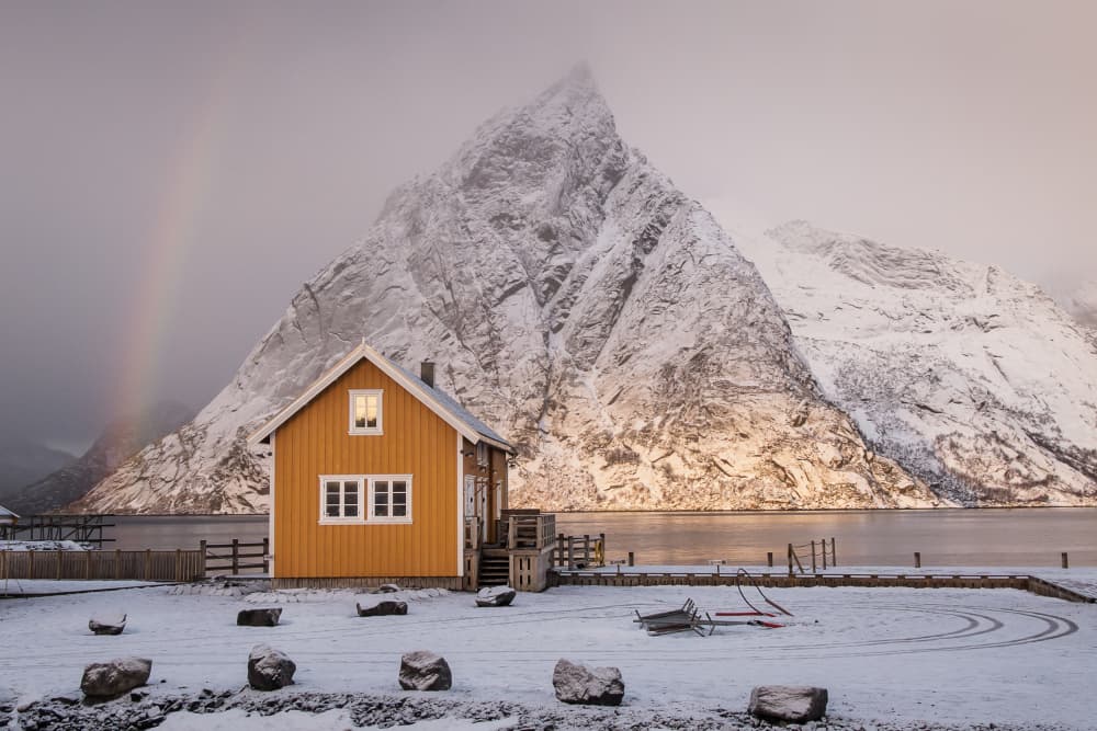 Yellow House Winter Rainbow by Dan Mirica — canvas wall art