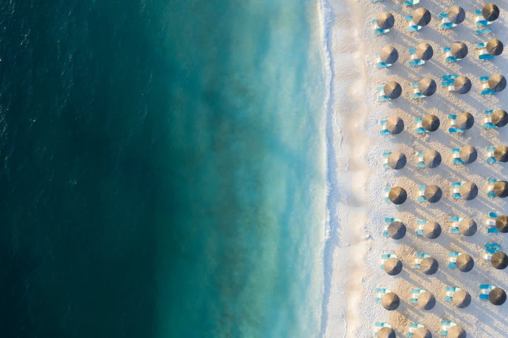 Turquoise Beach Umbrellas by Eros Erika — canvas wall art