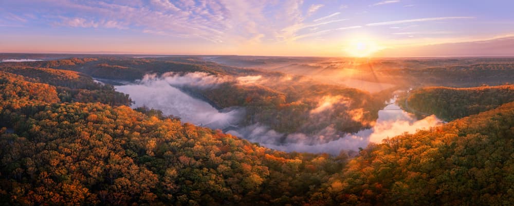 Sunrise Over Misty Valley by Liguang Huang — canvas wall art