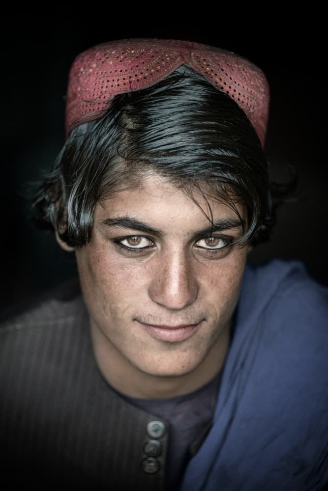 Young Man Striking Gaze by Trevor Cole — canvas wall art
