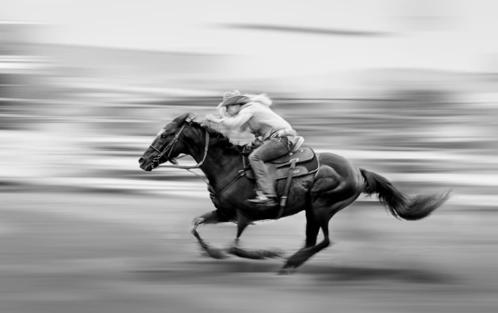 Galloping Cowgirl Rider by Leeian Dai — canvas wall art