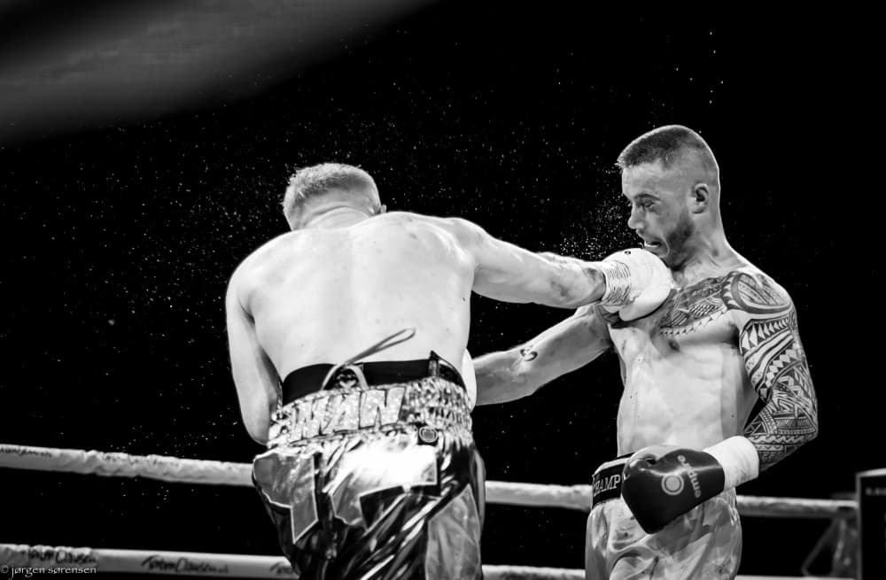 Intense Boxing Punch by Jørgen Sørensen — canvas wall art