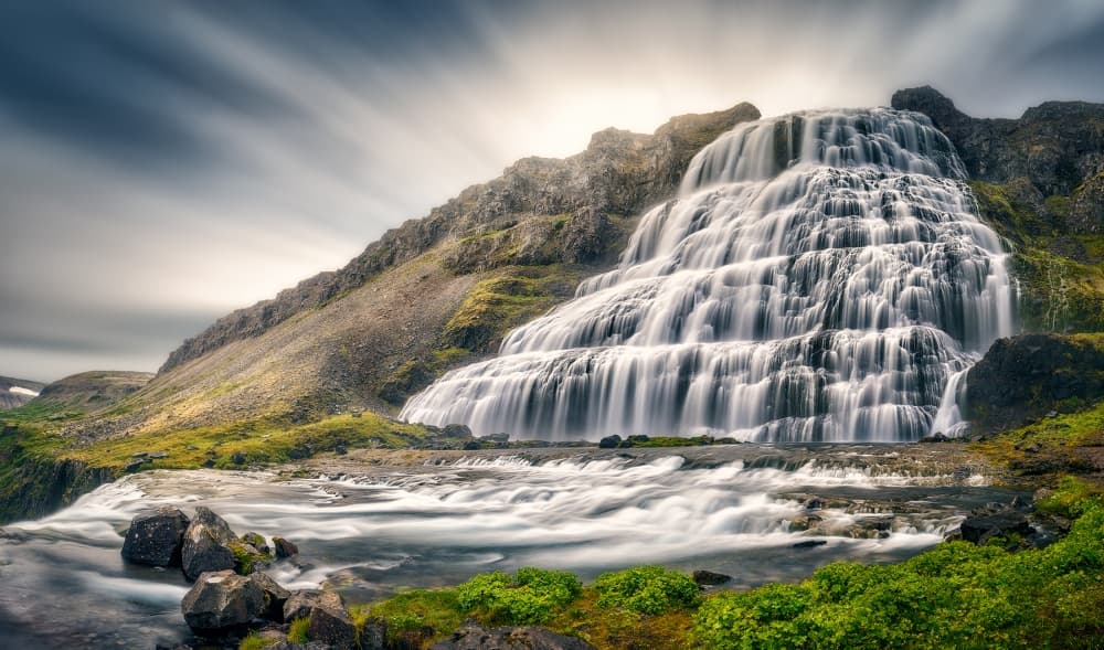 Majestic Sunlit Waterfall by Stefan Mitterwallner — canvas wall art