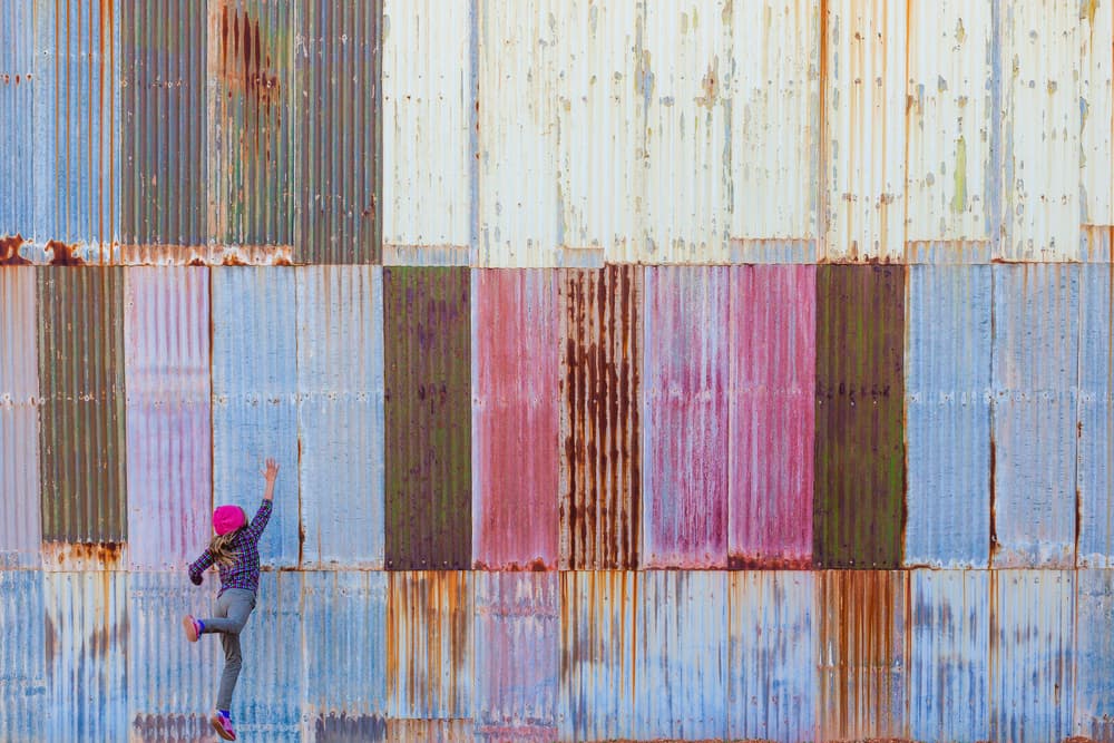 Girl Jumping Colorful Metal by Gloria Salgado Gispert — canvas wall art