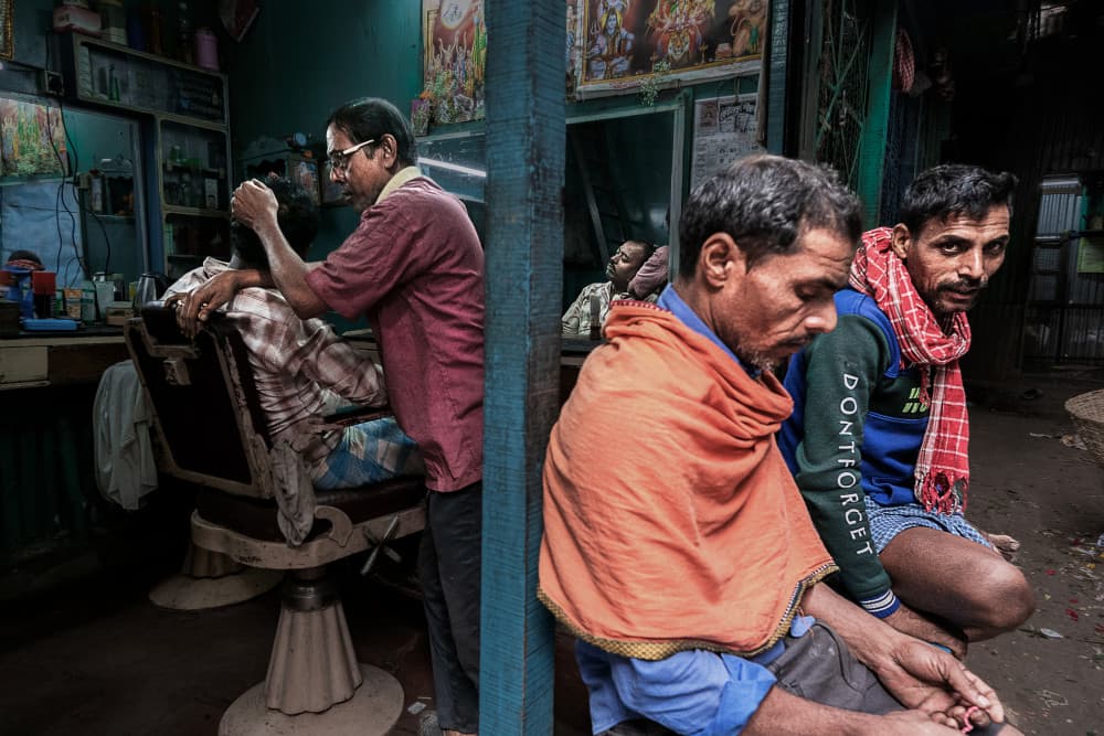 Candid Barbershop Life by Kuntal Biswas — canvas wall art