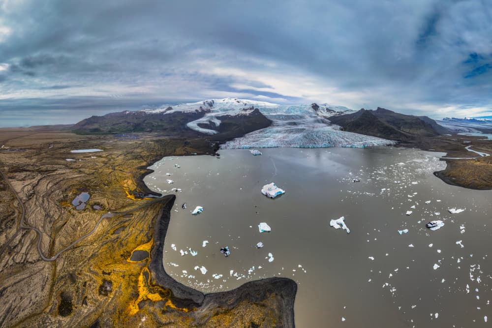 Glacial Lagoon Peaks by Jacek Swiercz — canvas wall art