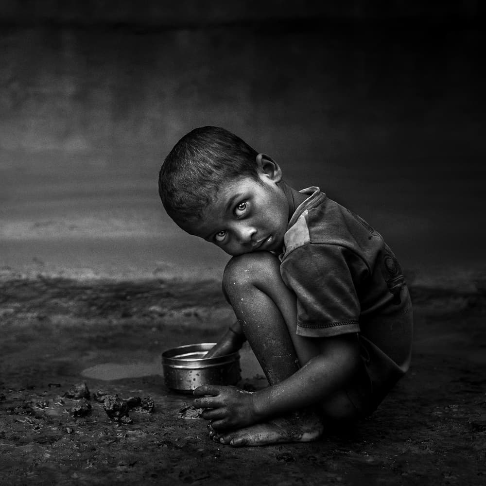 Muddy Child Deep Gaze by Fadhel Almutaghawi — canvas wall art